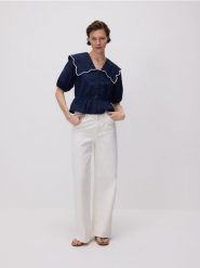 Jeansy wide leg ze średnim stanem - biały. Białe jeansy Reserved, bez wzorów. Za 199.99 zł.