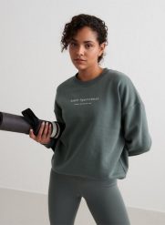 Damska bluza dresowa czesana, luźny krój Serif szałwiowa zieleń. Zielone bluzy AIM'N, s, bez wzorów, z bawełny, bez kaptura. Za 339.00 zł.