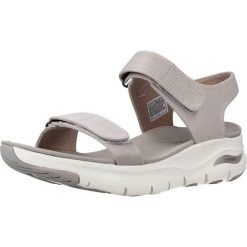 Sandały SKECHERS ARCH FIT TOURISTY Beżowy. Brązowe sandały Skechers, bez wzorów, z tkaniny, bez obcasa, bez zapięcia. Za 312.99 zł.