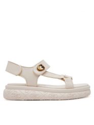 Guess Sandały FLJLAN ELE03 Beżowy. Brązowe sandały Guess, z aplikacjami, ze skóry, bez obcasa, na płaskiej podeszwie, bez zapięcia. Za 419.99 zł.
