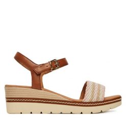 Sandały Marco Tozzi. Brązowe sandały Marco Tozzi, bez wzorów, bez obcasa, na koturnie, bez zapięcia. Za 249.99 zł.