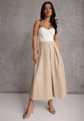 Beżowa Bawełniana Spódnica o Rozkloszowanym Kroju z Plisami Nerimara. Brązowe spódnice Renee, na co dzień, na lato, l, bez wzorów, z bawełny, casualowe, midi, proste. Za 119.99 zł.