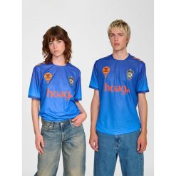 Koszulka domowa Hummel Orange County 2025/26. Białe bluzki Hummel, bez wzorów, sportowe, bez kołnierzyka, bez ramiączek. Za 343.00 zł.