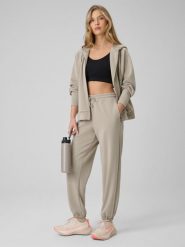 4F Spodnie z szerokimi nogawkami z modalem damskie - beżowe M. Brązowe spodnie dresowe 4f, na co dzień, m, bez wzorów, z dresówki. Za 189.99 zł.