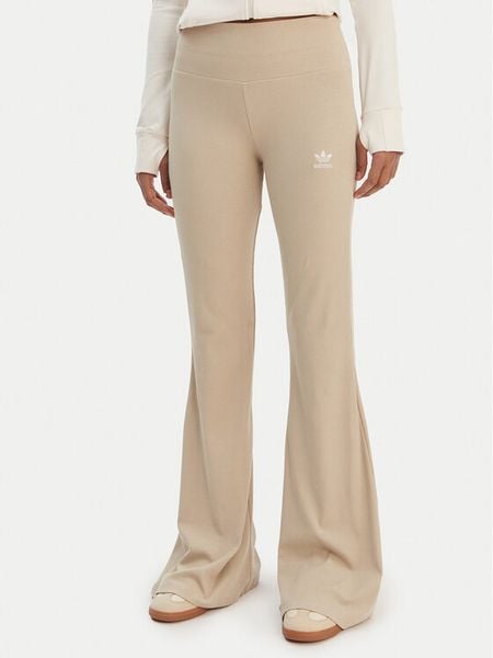 Adidas Legginsy Essentials KD3850 Beżowy Flared Leg. Brązowe legginsy Adidas, xs, bez wzorów, z bawełny. Za 219.99 zł.