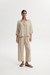 SPODNIE ZORA PIASKOWE XL - Flawless. Spodnie materiałowe Flawless, na co dzień, s, bez wzorów, z gumy. Za 389.00 zł.