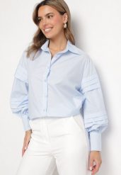 Jasnoniebieska Koszula z Bawełną Ozdobiona Szerokimi Rękawami Edimelia. Niebieskie koszule Born2be, m, bez wzorów, z bawełny, eleganckie, bez kołnierzyka, bez ramiączek. Za 89.99 zł.