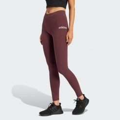 Legginsy Essentials Linear Cotton. Brązowe legginsy Adidas, uniwersalny, bez wzorów, z bawełny. W wyprzedaży za 83.85 zł.