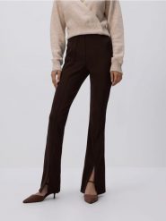 Legginsy z rozcięciami - ciemnobrązowy. Brązowe legginsy Reserved, l, bez wzorów, z dzianiny. Za 89.99 zł.