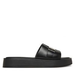 Klapki Calvin Klein. Czarne klapki Calvin Klein, bez wzorów, bez obcasa. Za 329.99 zł.