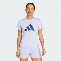 Koszulka Run It. Fioletowe bluzki Adidas, xs, bez wzorów, sportowe, bez kołnierzyka, bez ramiączek. Za 139.00 zł.