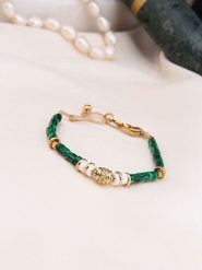 Charlize Pozłacana bransoletka z malachitami rozmiar: onesize. Zielone bransoletki Charlize, z malachitem, pozłacane. Za 78.66 zł.
