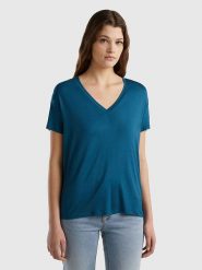 Benetton Koszulka w kolorze morskim rozmiar: XL. Niebieskie bluzki Benetton, xl, bez wzorów, bez kołnierzyka, bez ramiączek. Za 57.47 zł.