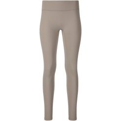 Damskie legginsy Athlecia Luxe. Brązowe legginsy Athlecia, bez wzorów, z materiału. Za 269.50 zł.