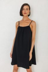 SUKIENKA BELLA CZARNA S - Flawless. Czarne sukienki Flawless, s, bez wzorów, ze skóry, retro, bez kołnierzyka, bez ramiączek, mini. Za 398.00 zł.