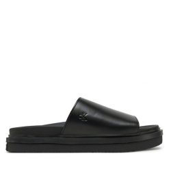 Klapki Calvin Klein Jeans. Czarne klapki Calvin Klein Jeans, bez wzorów, z jeansu, bez obcasa. Za 219.99 zł.