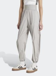Adidas Spodnie dresowe w kolorze szarym rozmiar: XS. Szare spodnie dresowe Adidas, xs, bez wzorów, z dresówki. Za 144.58 zł.