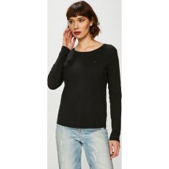 Tommy Jeans - Bluzka. Białe bluzki Tommy Jeans, l, bez wzorów, z bawełny, bez kołnierzyka, bez ramiączek. W wyprzedaży za 119.90 zł.