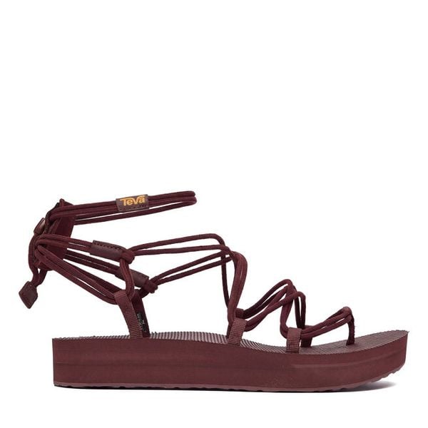 Sandały Teva. Czerwone sandały Teva, bez wzorów, bez obcasa, na płaskiej podeszwie, bez zapięcia. Za 299.99 zł.
