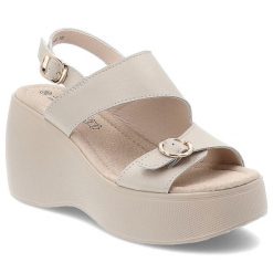 Beżowe Sandały S.Barski Stylowe Obuwie Damskie Na Koturnie. Brązowe sandały S.BARSKI, bez wzorów, eleganckie, bez obcasa, na koturnie, bez zapięcia. Za 199.00 zł.