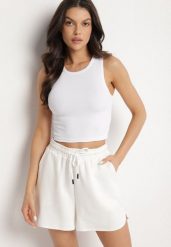 Biały Krótki Tank Top z Prążkowanej Tkaniny Nevallia. Białe topy Born2be, l, bez wzorów, z jeansu, bez kołnierzyka, bez ramiączek. Za 19.99 zł.