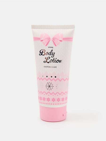 Balsam do ciała o zapachu ciasteczkowym - różowy. Czerwone balsamy i kremy do ciała Sinsay, bez wzorów. Za 12.99 zł.