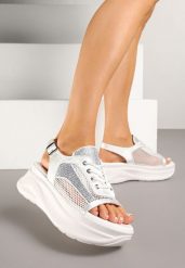 Białe Sandały Sneakersy Peep Toe z Siateczką Sorialise. Białe sandały Born2be, z aplikacjami, biznesowe, z otwartym noskiem, bez obcasa, na płaskiej podeszwie, bez zapięcia. W wyprzedaży za 104.99 zł.