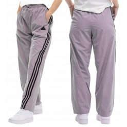 Adidas spodnie dresowe damskie sportowe treningowe Future Icons. Fioletowe spodnie dresowe Adidas, bez wzorów, z dresówki. Za 229.99 zł.