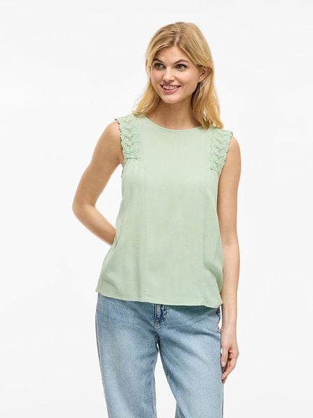Vila Bluzka "Pernillu" w kolorze jasnozielonym rozmiar: 34. Zielone bluzki Vila, bez wzorów, z koronki, bez kołnierzyka, bez ramiączek. Za 48.05 zł.