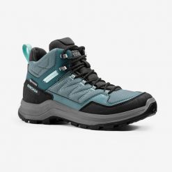 Buty turystyczne damskie Quechua MH100 Mid wodoodporne. Trekkingi QUECHUA, z kauczuku, przed kolano, trekkingowe. Za 269.99 zł.
