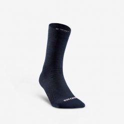 Skarpety turystyczne Quechua SH100 Mid. Niebieskie skarpety QUECHUA, bez wzorów, z elastanu. Za 39.99 zł.