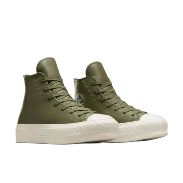 Damskie>buty sneakers Damskie Converse. Zielone trampki Converse, bez wzorów, bez zapięcia. W wyprzedaży za 366.60 zł.