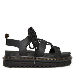 Sandały Dr. Martens. Czarne sandały Dr. Martens, bez wzorów, bez obcasa, na płaskiej podeszwie, bez zapięcia. Za 409.99 zł.