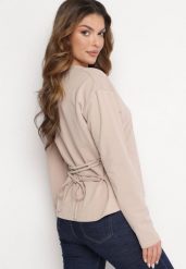 Beżowa Bawełniana Bluza z Długim Rękawem i Ozdobnym Wiązaniem Pinada. Brązowe bluzy Born2be, bez wzorów, z bawełny, bez kaptura. Za 84.99 zł.