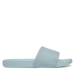 Klapki Calvin Klein Jeans. Niebieskie klapki Calvin Klein Jeans, bez wzorów, z jeansu, bez obcasa. Za 99.99 zł.