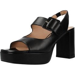 Sandały UNISA ODELA NTO Czarny. Czarne sandały Unisa, bez wzorów, ze skóry, bez obcasa, bez zapięcia. Za 598.99 zł.