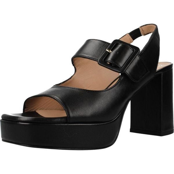 Sandały UNISA ODELA NTO Czarny. Czarne sandały Unisa, bez wzorów, ze skóry, bez obcasa, bez zapięcia. Za 593.99 zł.