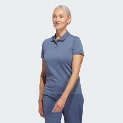 Koszulka Ultimate365 Tour Primeknit Polo. Niebieskie koszulki polo Adidas, uniwersalny, bez wzorów, z materiału, bez kołnierzyka, bez ramiączek. W wyprzedaży za 179.65 zł.