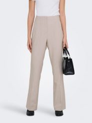 ONLY Spodnie "Raven" w kolorze beżowym rozmiar: 34/L32. Brązowe spodnie materiałowe Only, na co dzień, l, bez wzorów, z materiału, z podwyższonym stanem. Za 104.99 zł.