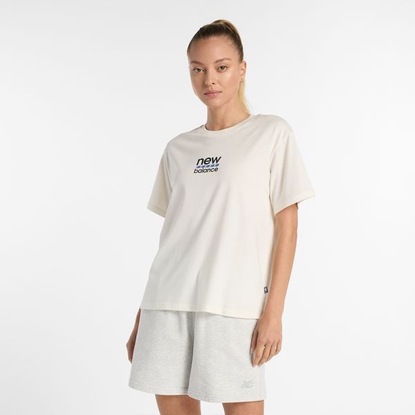 Koszulka damska New Balance WT51541SST – beżowa. Brązowe bluzki New Balance, s, bez wzorów, z bawełny, eleganckie, bez kołnierzyka, bez ramiączek. Za 79.99 zł.