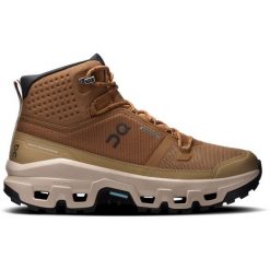 Buty damskie On Cloudrock Mid Waterproof. Brązowe trekkingi On, z gumy, przed kolano, trekkingowe. Za 879.99 zł.