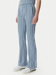 Lacoste Spodnie dresowe XF9313 Niebieski jasny Regular Fit. Niebieskie spodnie dresowe Lacoste, bez wzorów, z dresówki. Za 739.99 zł.