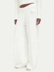 Juicy Couture Spodnie dzianinowe JCWBJ226310 Kremowy Relaxed Fit. Białe spodnie materiałowe Juicy Couture, l, bez wzorów, z dzianiny. Za 449.99 zł.