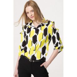 Żółta Koszula The Hunt. Żółte koszule Born2be, m, bez wzorów, bez kołnierzyka, bez ramiączek. Za 49.99 zł.