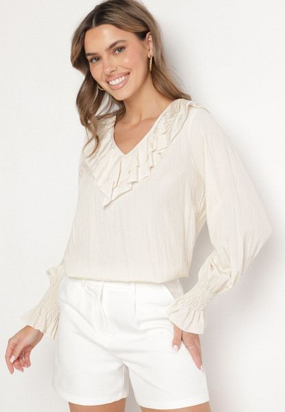 Beżowa Bluzka z Wiskozą w Rustykalnym Stylu z Falbanami Finlimi. Brązowe bluzki Born2be, bez wzorów, z jeansu, eleganckie, bez kołnierzyka, bez ramiączek. Za 69.99 zł.