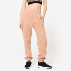 Spodnie dresowe damskie Domyos Gym & Pilates. Spodnie dresowe DOMYOS, xl, bez wzorów, z bawełny, na fitness i siłownię. W wyprzedaży za 79.99 zł.