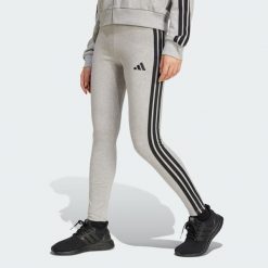 Legginsy Essentials 3-Stripes Cotton. Czarne legginsy sportowe Adidas, xs, bez wzorów, z bawełny, na fitness i siłownię. Za 149.95 zł.