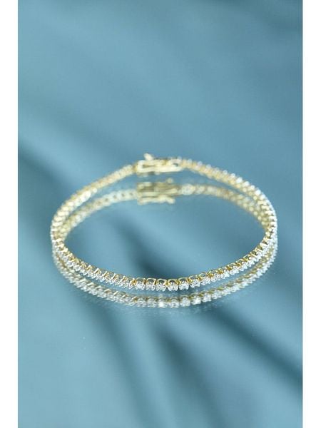 DIAMANTA Złota bransoletka "Rivière" z diamentami rozmiar: onesize. Żółte bransoletki DIAMANTA, z diamentem, złote. Za 6,524.99 zł.