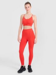 4F Legginsy treningowe bezszwowe damskie - czerwone M/L. Czerwone legginsy sportowe 4f, l, bez wzorów, z dzianiny, z podwyższonym stanem, na fitness i siłownię. W wyprzedaży za 79.99 zł.