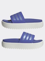 Adidas Klapki w kolorze fioletowo-białym rozmiar: 40,5. Różowe klapki Adidas, bez wzorów, z otwartym noskiem, bez obcasa. Za 185.76 zł.